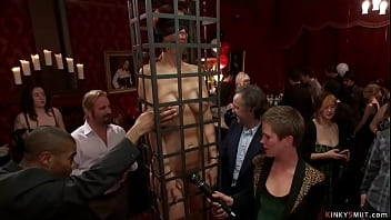 Huge tits MILF slaves Simone Sonay and Syren de Mer are caged and groped and tormented by public then they are prodded in bdsm orgy party