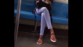 Young girl crossed legs in the train