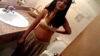 Cute girl strips in toilett