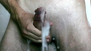 Young boy jerking off with cumshot on display