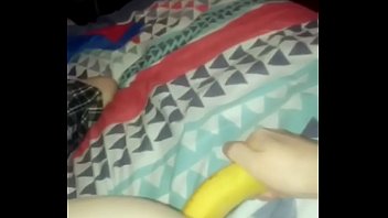 18 year old boy puts a big banana in his big ass