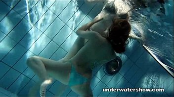 Zuzanna and Lucie playing underwater