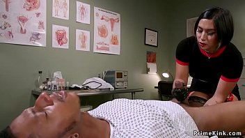 Busty brunette Asian doctor anal fingers black male patient and makes him lick her in face sitting