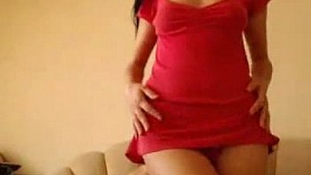 Sexy cam babe dildos her tight pussy in short red dress