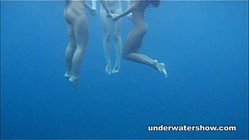 3 girls stripping in the sea